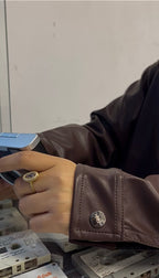 Dark amber leather jacket